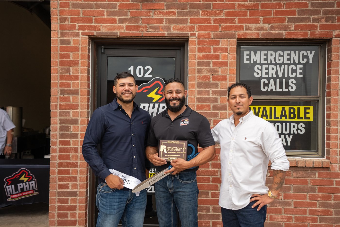 Alpha Electrical Solutions team at their Grand Opening — Rowlett Chamber of Commerce ribbon cutting